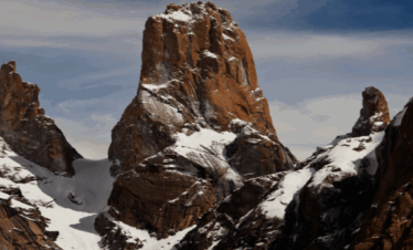 Trango Tower in snow