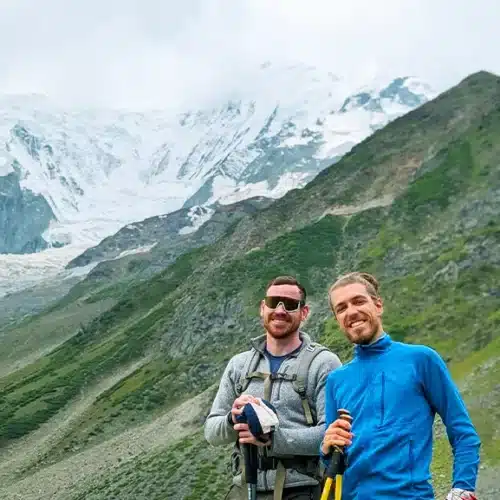 Two international clients at Rakaposhi Base Camp with Skardu Trekkers