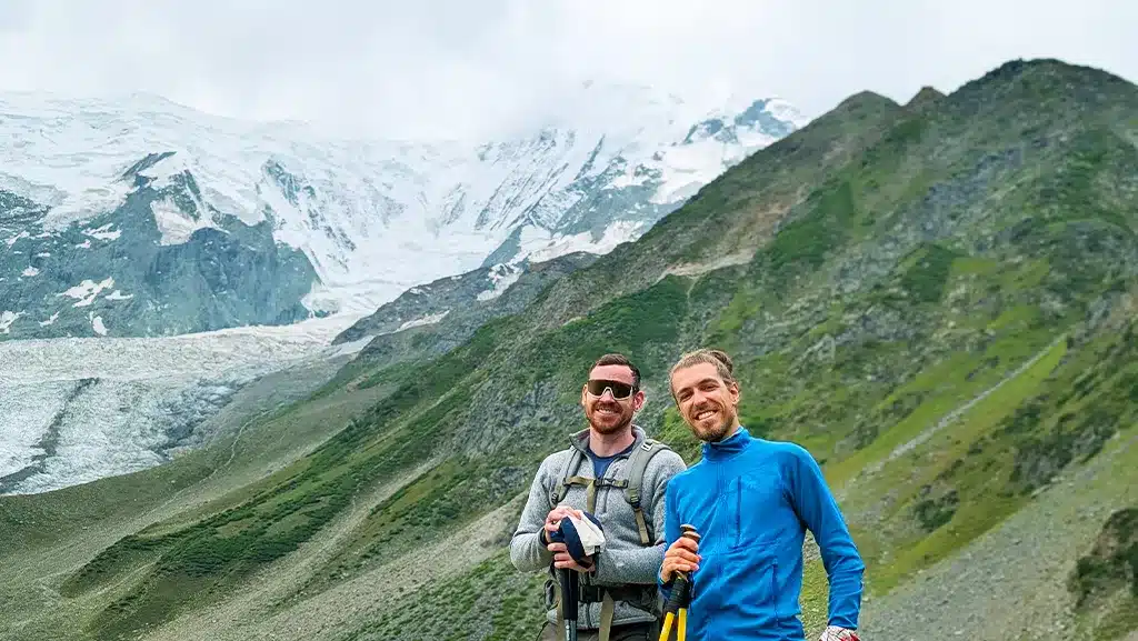 Two international clients at Rakaposhi Base Camp with Skardu Trekkers