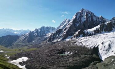 Campsite in Nangma Valley surrounded by towering granite spires in the Karakoram Mountains, Baltistan Pakistan.
